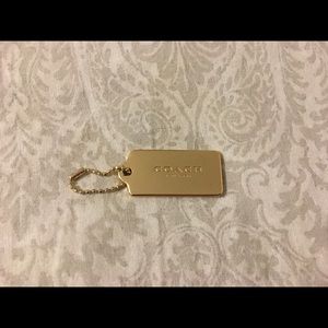 Coach hand tag